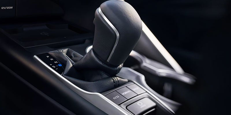 The gear shifter of a 2025 Toyota Camry Hybrid